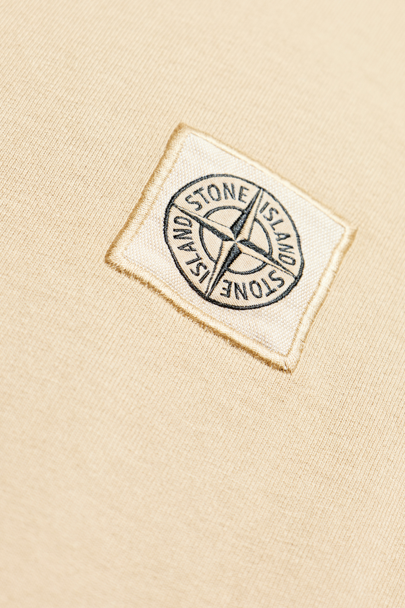 Beżowy T-shirt z logo Stone Island - Vitkac Polska